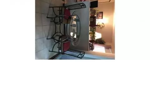 Glass round table w/. 4 chairs